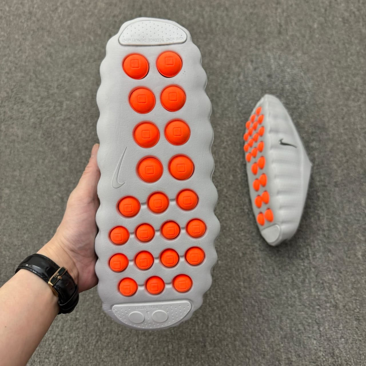 Nike Mind 001 recovery mule in the "Light Smoke Grey"