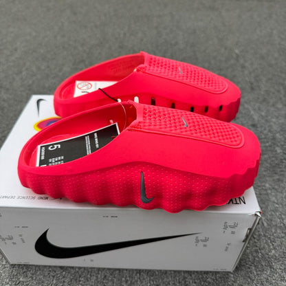 Nike Mind 001 Pregame Mule in the Solar Red colorway