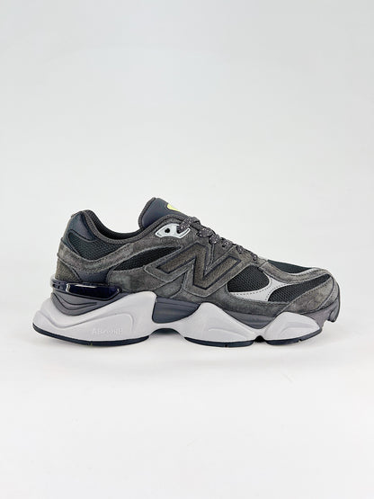 New Balance 9060 sneakers shown are in a black and cement colorway, often featuring a durable mesh and suede construction with Lime accents