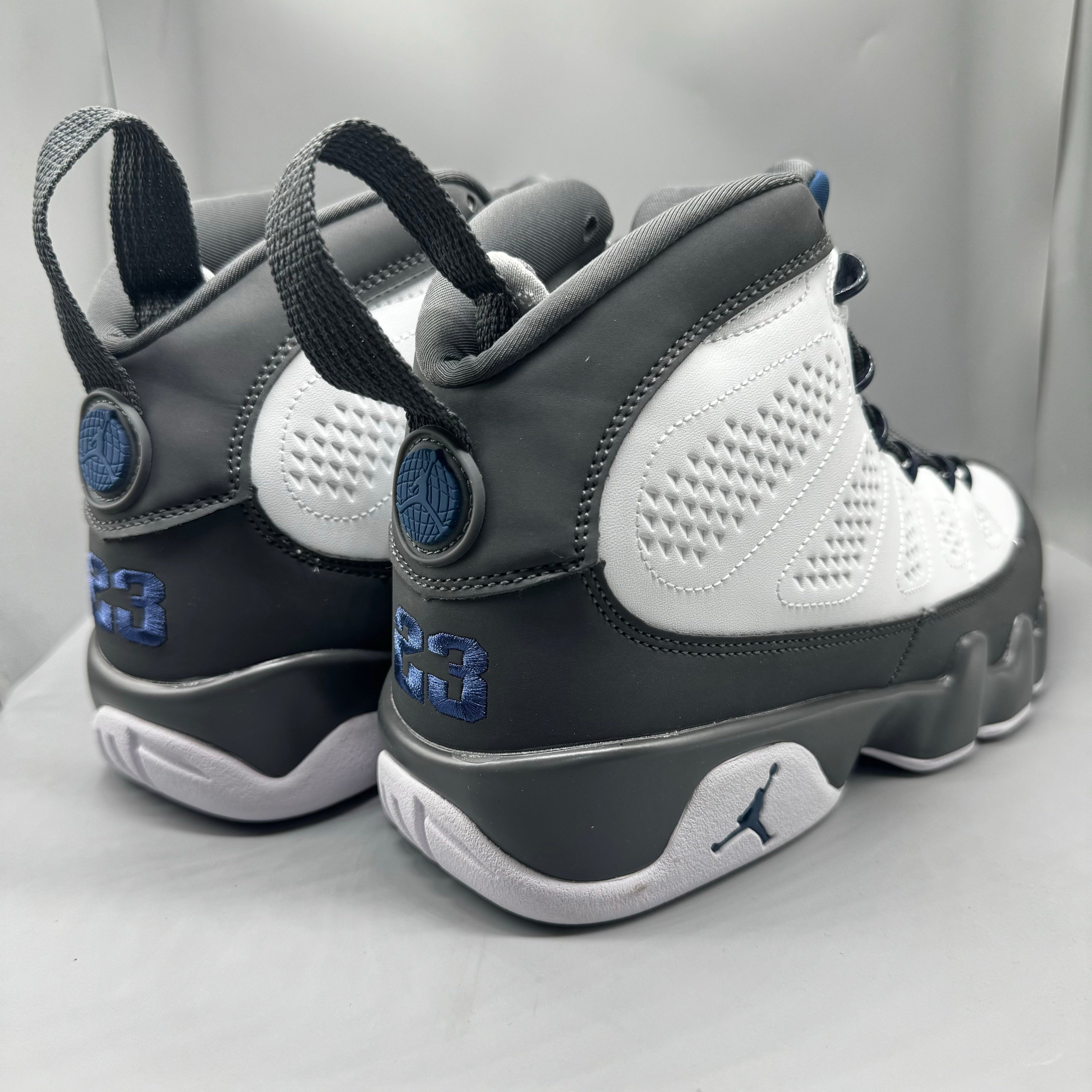 Air Jordan 9 Retro "Flint Grey" sneakers with white, French blue, and Flint grey colors