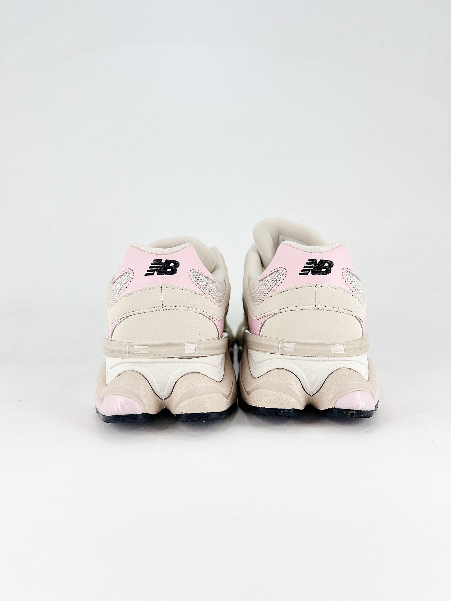 New Balance 9060 sneakers, featuring a lifestyle design that blends elements from the 99X series with Y2K-inspired tech aesthetics