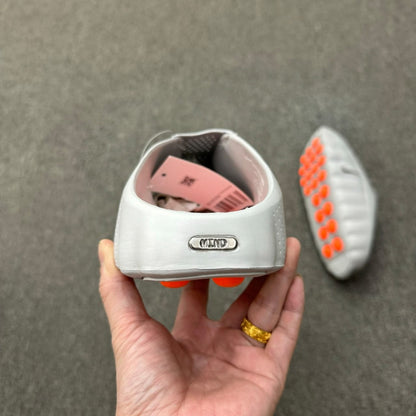 Nike Mind 001 recovery mule in the "Light Smoke Grey"