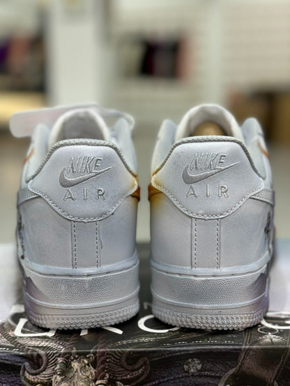 Nike Air Force 1 sneakers featuring a fantasy-themed warrior design