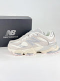 New Balance 9060 sneakers, featuring a retro-futuristic design inspired by archival models like the 990 serie
