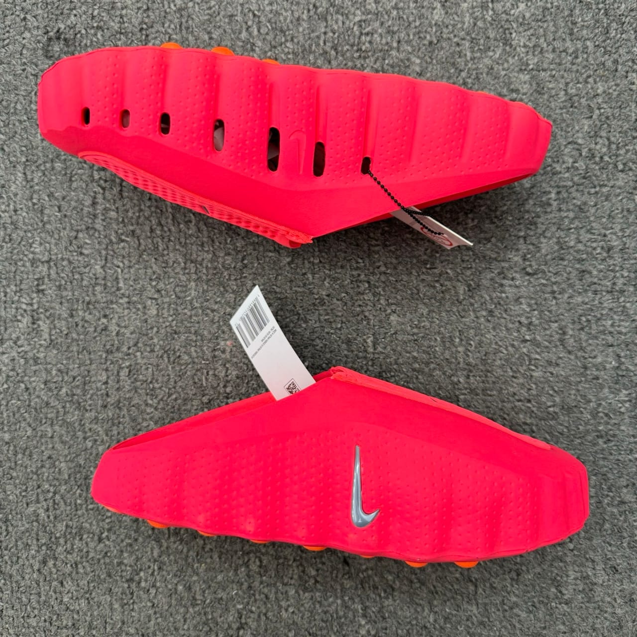 Nike Mind 001 Pregame Mule in the Solar Red colorway