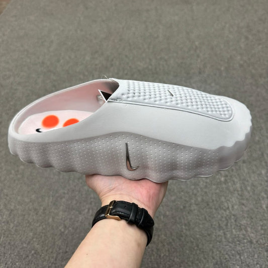 Nike Mind 001 recovery mule in the "Light Smoke Grey"