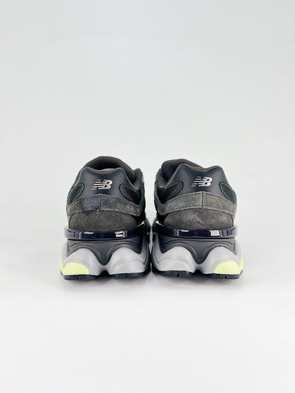 New Balance 9060 sneakers shown are in a black and cement colorway, often featuring a durable mesh and suede construction with Lime accents