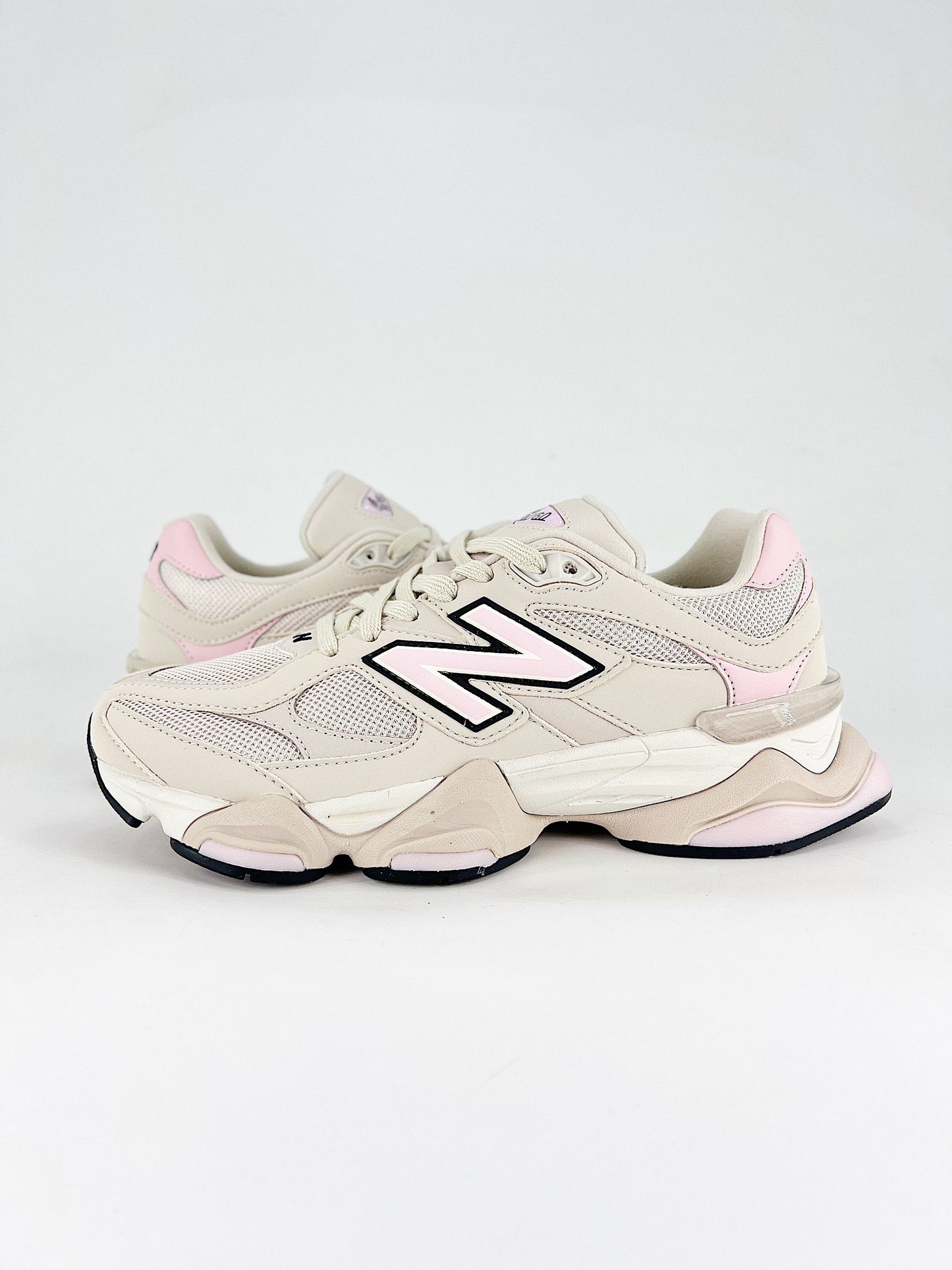 New Balance 9060 sneakers, featuring a lifestyle design that blends elements from the 99X series with Y2K-inspired tech aesthetics