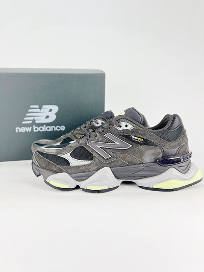 New Balance 9060 sneakers shown are in a black and cement colorway, often featuring a durable mesh and suede construction with Lime accents