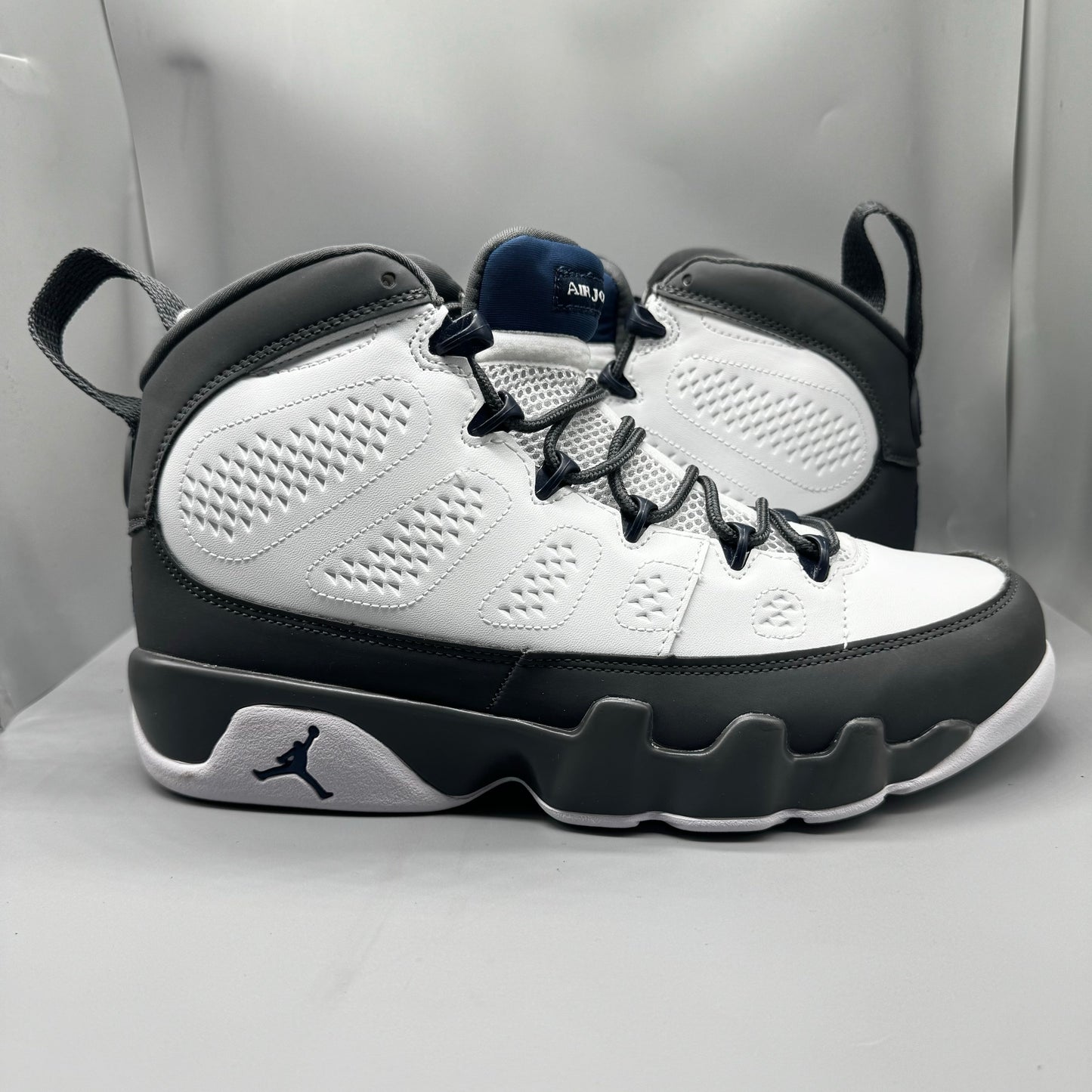 Air Jordan 9 Retro "Flint Grey" sneakers with white, French blue, and Flint grey colors