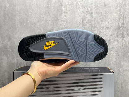 Air Jordan 4 Retro "Lakers" sneaker in an Imperial Purple nubuck upper with black and yellow accents