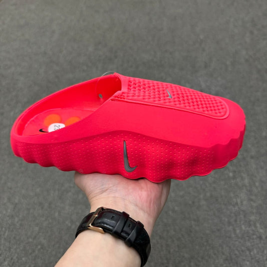Nike Mind 001 Pregame Mule in the Solar Red colorway