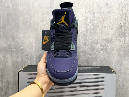 Air Jordan 4 Retro "Lakers" sneaker in an Imperial Purple nubuck upper with black and yellow accents