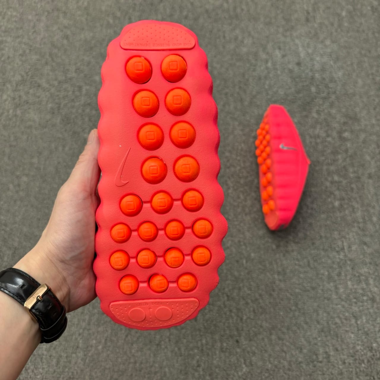 Nike Mind 001 Pregame Mule in the Solar Red colorway
